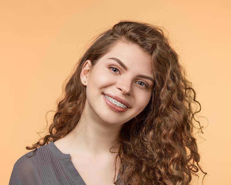 Greater Indianapolis orthodontist explaining clear ceramic braces