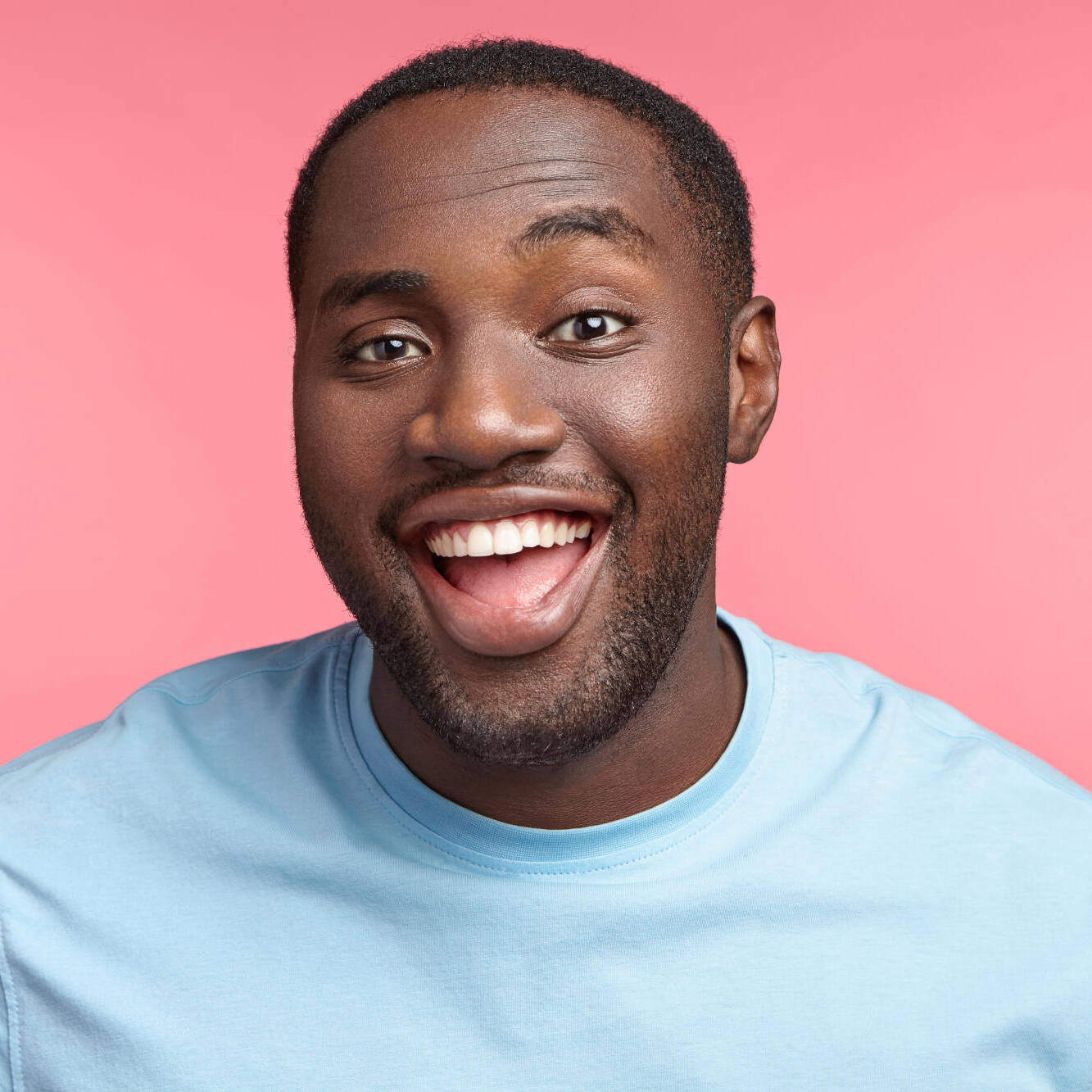 Happy,dark,skinned,fat,man,laughs,at,good,joke,,has